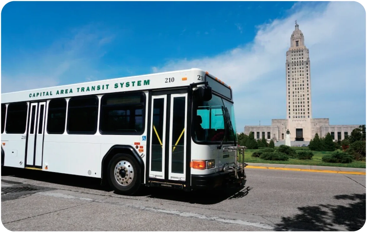 Capital Area Transit System fare card photographed with a city bus and state capitol
